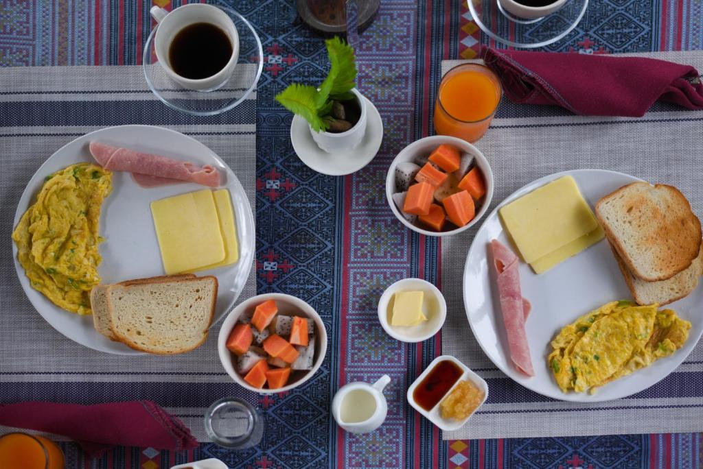 Fresh breakfast spread featuring local Lao ingredients and international options